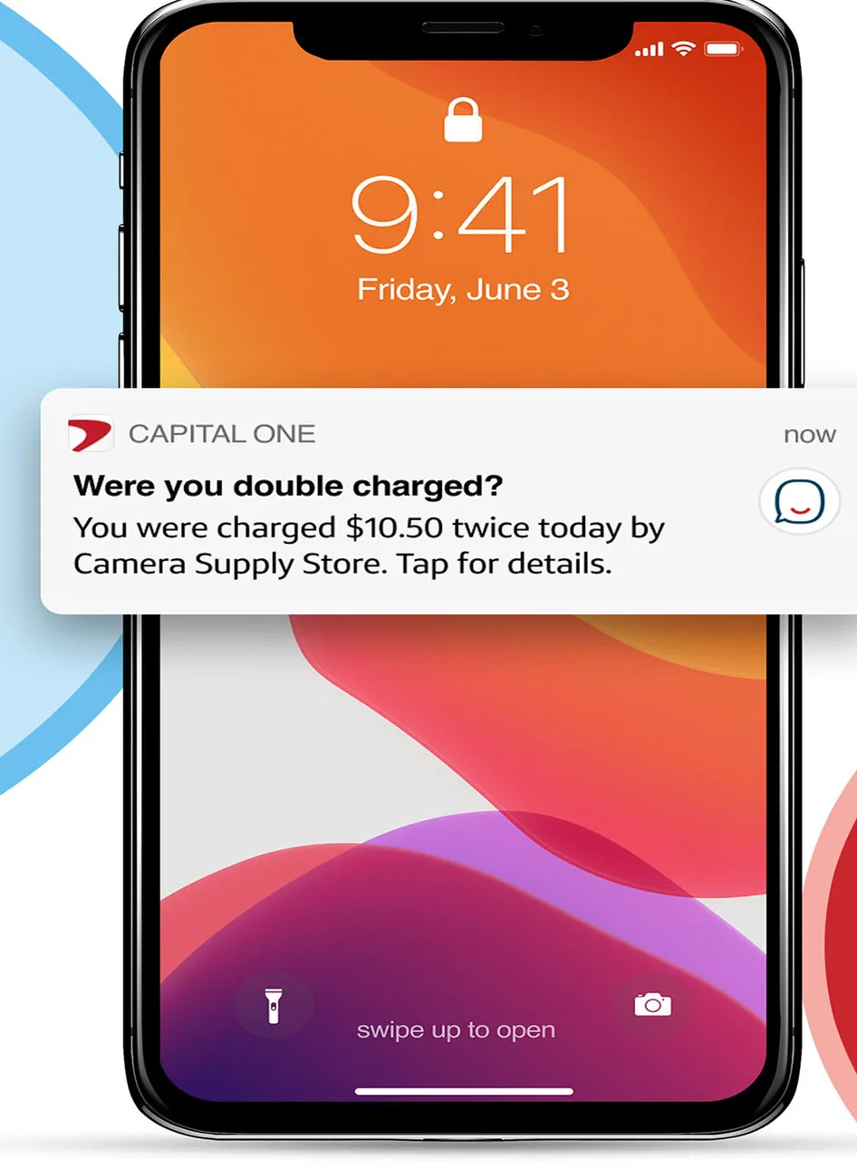Capital One purchase alert on a phone lock screen